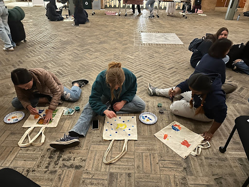 SWE OHP - Student decorating bags at event