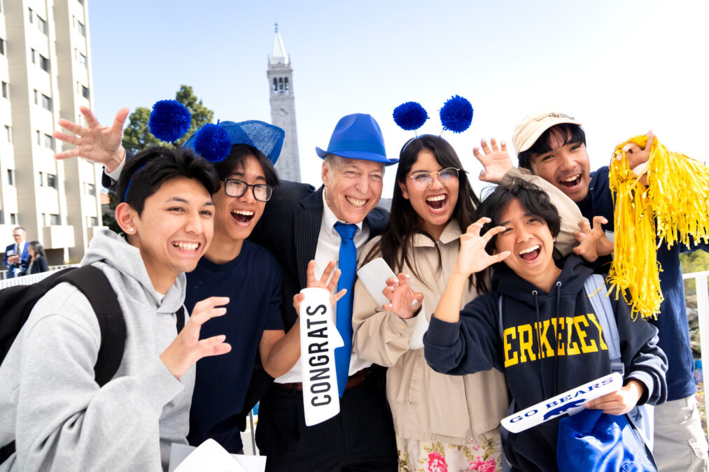 Alumnus and donor Eugene Jarvis poses with students for a photo