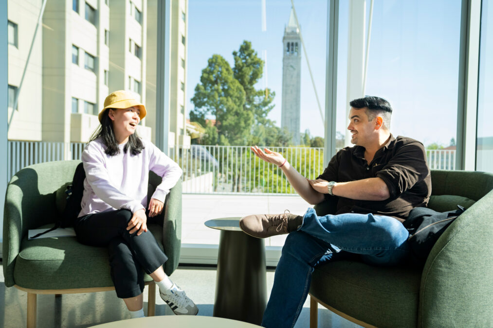 Attendees try out chairs in the Campanile Lounge
