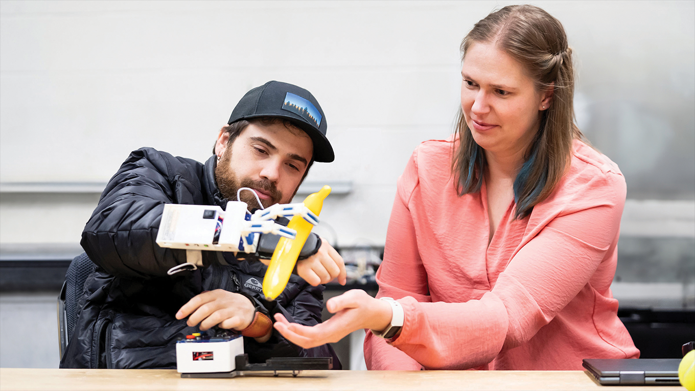 Drew McPherson and Hannah Stuart demonstrate the newest version of the Dorsal Grasper in the Embodied Dexterity Group’s lab at UC Berkeley.