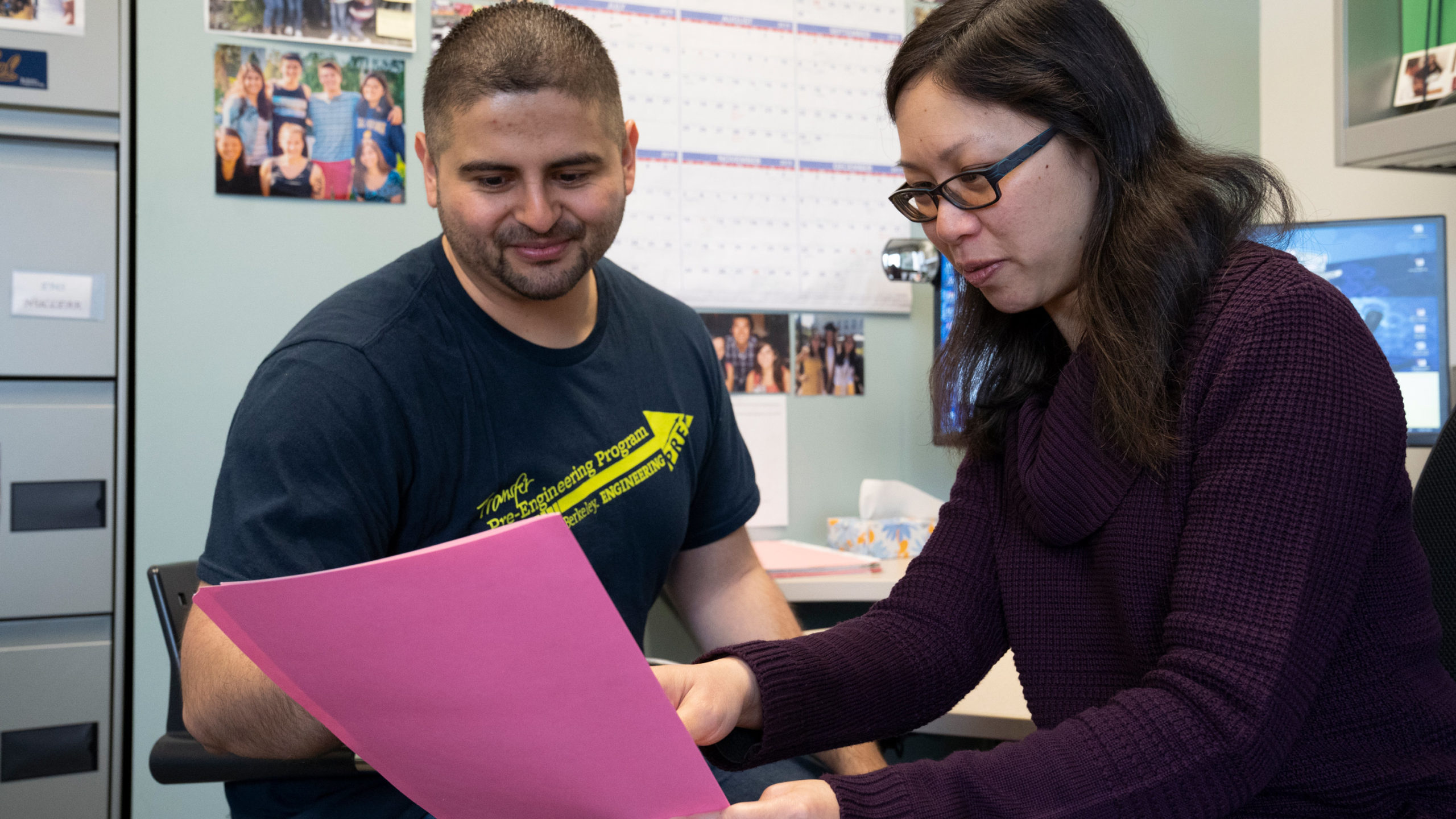 Student and ESS adviser in office