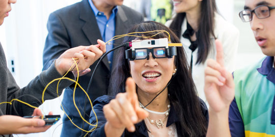 Woman using augmented reality glasses