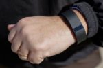 Fitbit fitness tracker on man